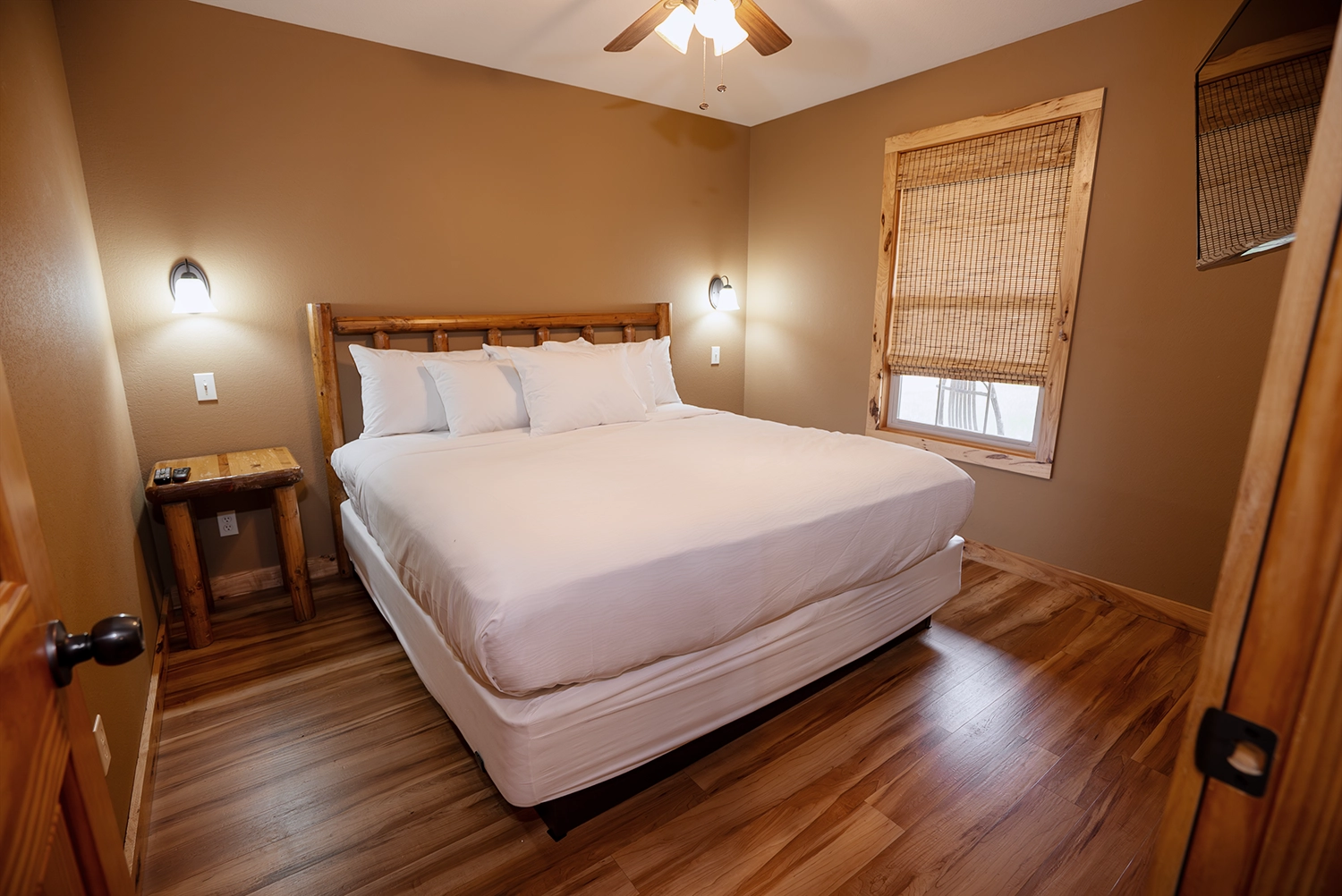 Bedroom of a One-Bedroom Cottage at Santa's Cottages.